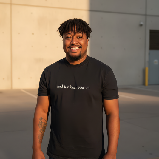 THE BEAT GOES ON TEE BLACK